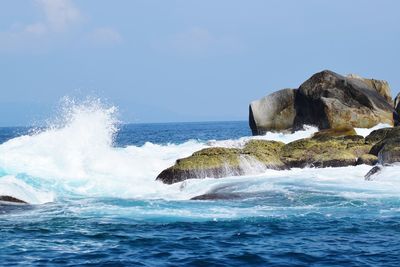 Scenic view of sea against clear blue sky