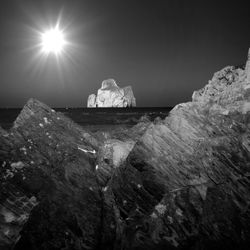 Sun shining over rocks