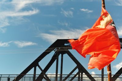 Low angle view of flag against sky