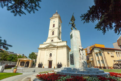 Low angle view of building against blue sky