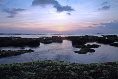 Scenic view of sea against sky during sunset