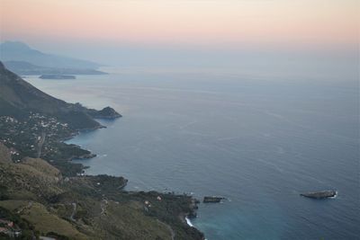 High angle view of sea against sky during sunset