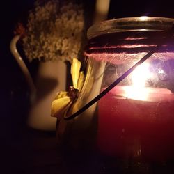 Close-up of flower vase on table at home