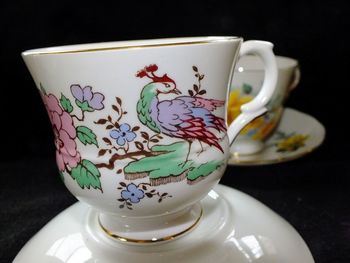 Close-up of coffee cup on table