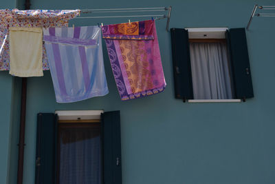 Clothes drying against building