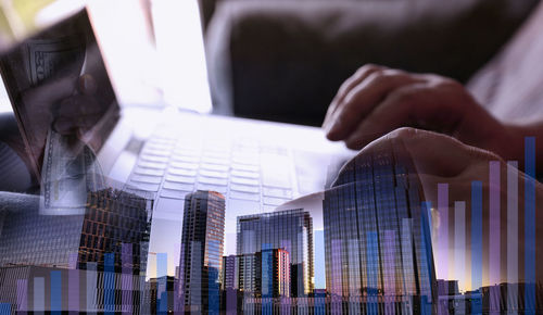 Midsection of man working at office building