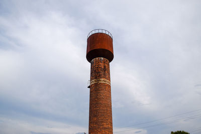 Low angle view of water tower against sky