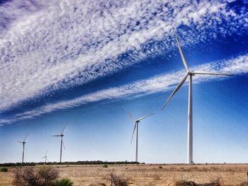 Wind turbines on field