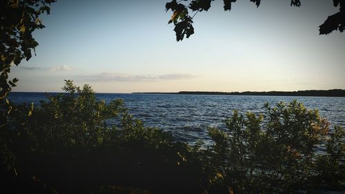 Scenic view of sea at sunset