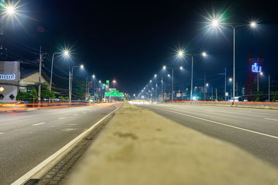 Surface level of light trails on road at night