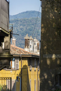 Architecture and chimney detail in the old city of bergamo, italy, europe