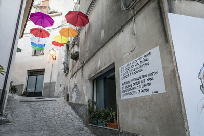 Low angle view of text on building