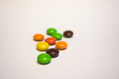 High angle view of multi colored balls on table