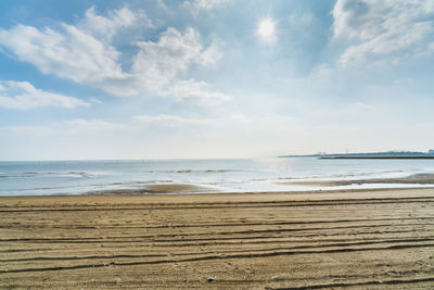 Scenic view of beach against sky