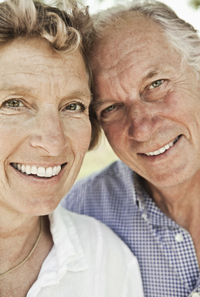 Close up portrait of smiling couple
