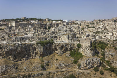 Aerial view of town against clear sky