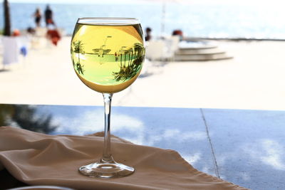 Close-up of wineglass on table in restaurant