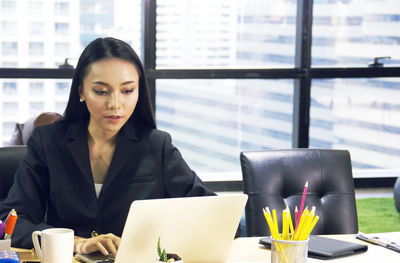 Woman working on table