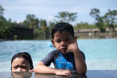 Two children in the swimming in pool