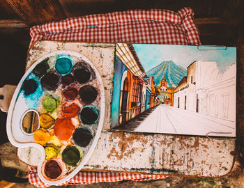 High angle view of multi colored umbrellas on table