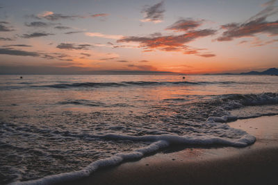 Scenic view of sea against sky during sunset