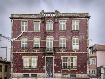 Low angle view of residential building against sky