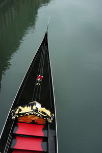 High angle view of boat sailing in lake