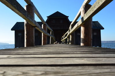 Pier over sea against sky