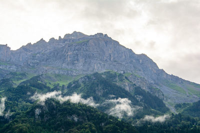 Scenic view of rocky mountains against sky