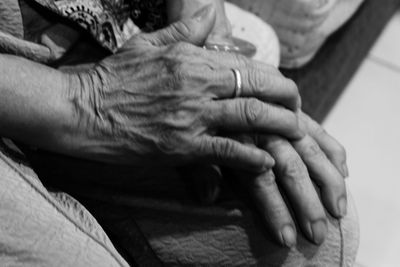 Midsection of woman with hands