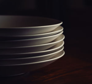 Close-up of stack of bowl on table