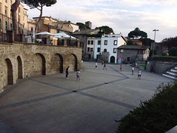 People in front of historical building