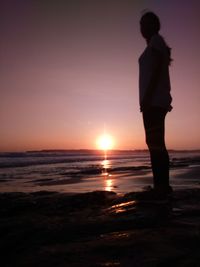 Scenic view of sea at sunset