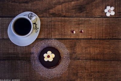 Directly above shot of coffee cup on table