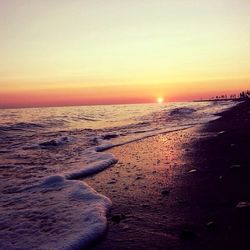 Scenic view of sea at sunset