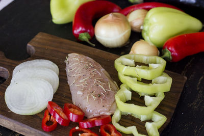 High angle view of chopped vegetables on cutting board