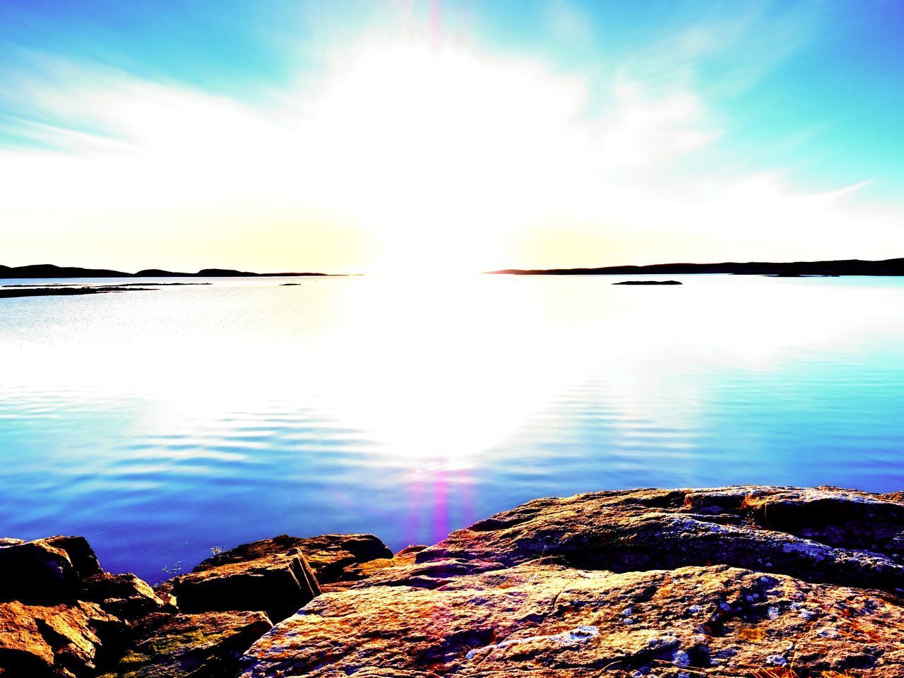 SCENIC VIEW OF LAKE AGAINST SKY