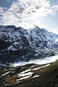 Scenic view of snowcapped mountains against sky