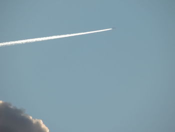 Low angle view of vapor trail in sky