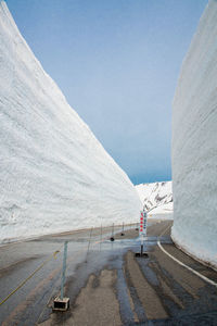 Scenic view of road against clear sky