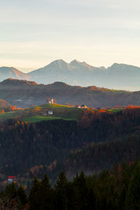 Scenic view of mountains against sky during sunset