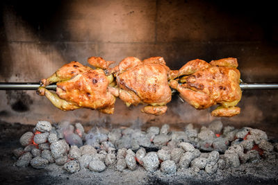 Close-up of meat on barbecue grill