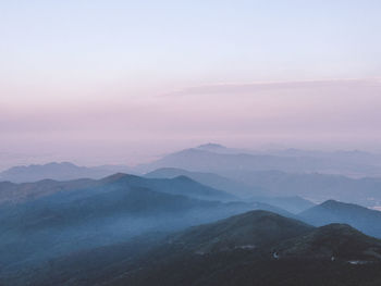 High angle view of mountains covered with fog