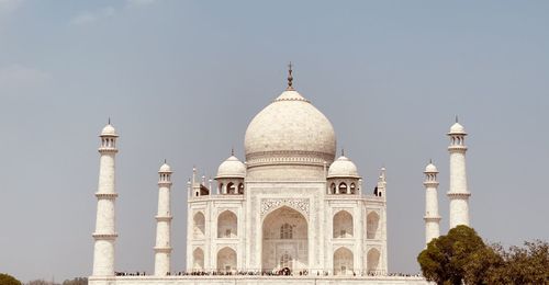 Low angle view of mosque against clear sky