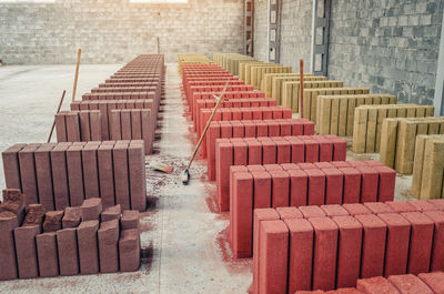 Drying of finished paving stones at factory. concrete palisades. colored paving stones