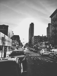 Cars on road in city