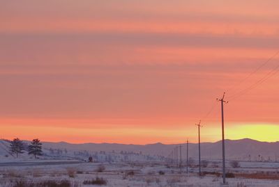 Scenic view of mountains at sunset