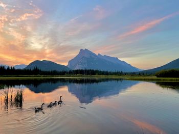 Scenic view of lake against sky during sunset