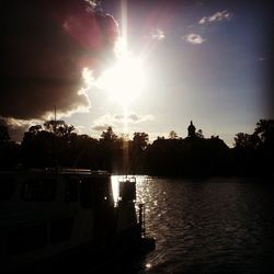 Scenic view of lake at sunset