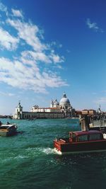 Grand canal against sky in city